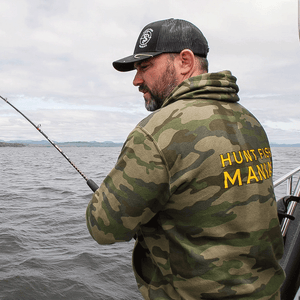 Paul Marier wearing a Camo 'Hunt Fish Maniac' Pullover Hooded Sweatshirt while fishing.